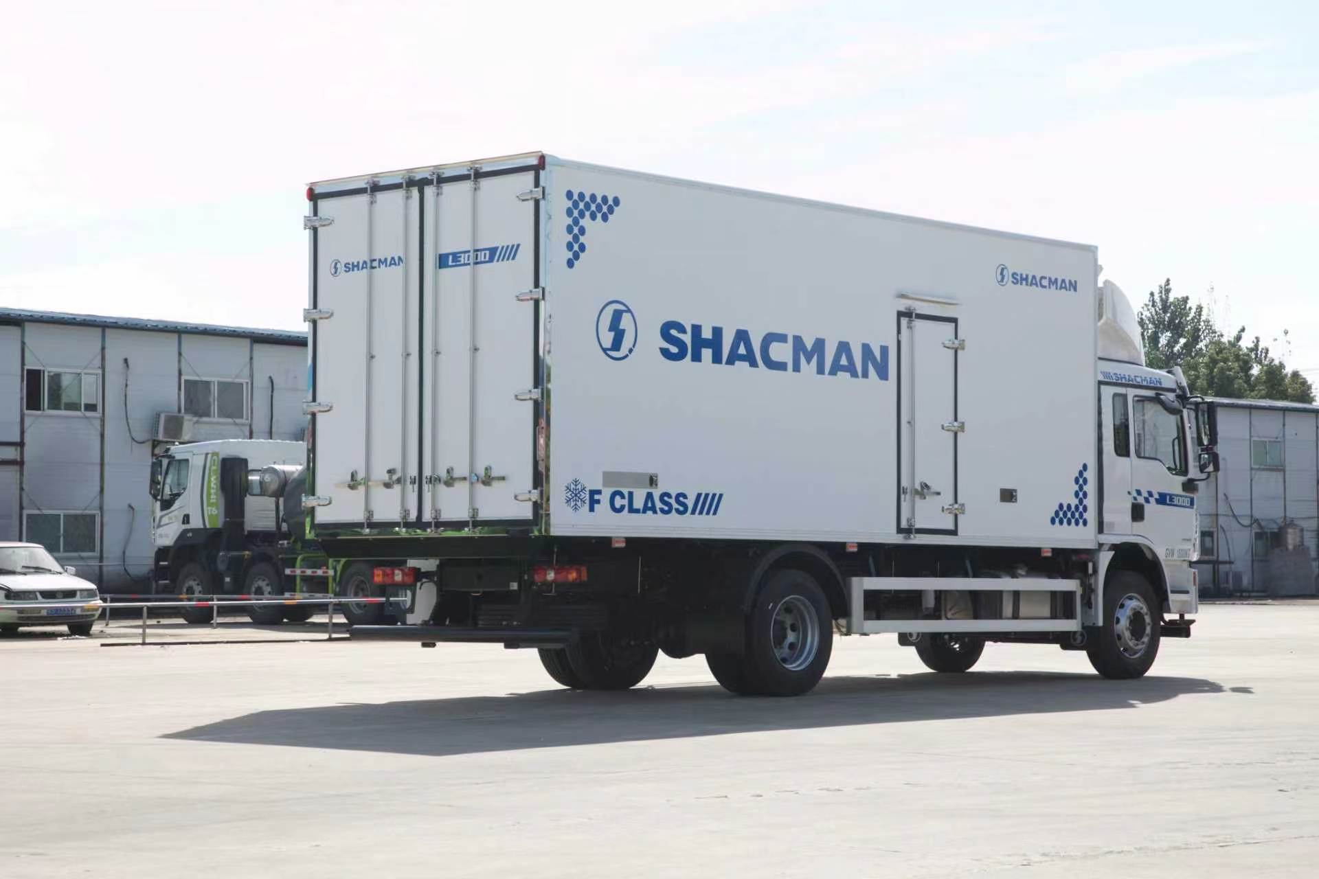 White SHACMAN L3000 refrigerated box truck with rear and side access doors