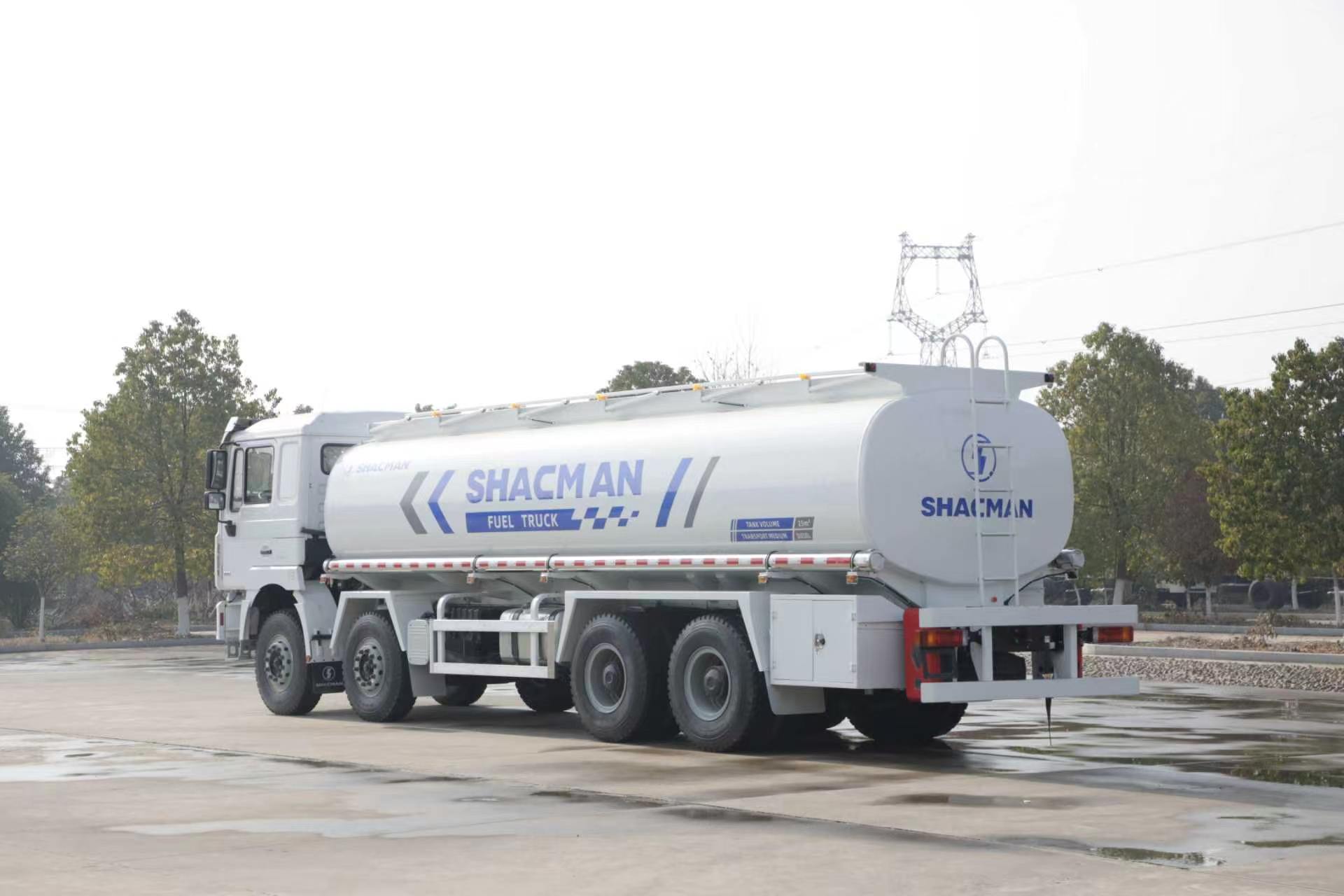 Rear-left view of a SHACMAN F3000 8x4 fuel truck showing the three-compartment tanker body